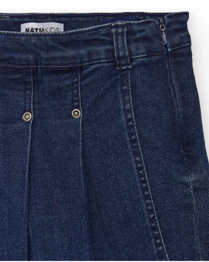 Girl’s dark blue denim-style skort with pleats