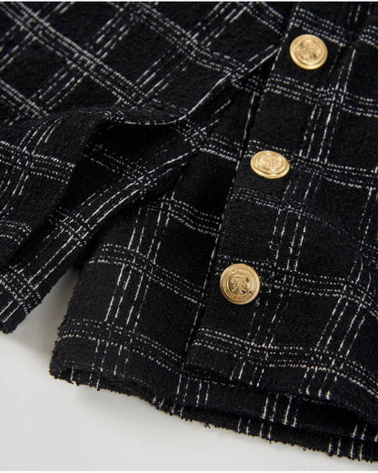 Girls’ black tweed shorts with checks and gold buttons