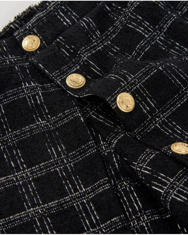 Girls’ black tweed shorts with checks and gold buttons