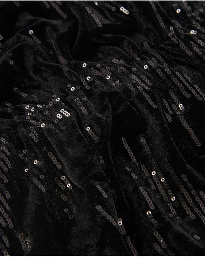 Girls’ black velvet dress with sequins and long sleeves